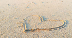 heart drawn on beach