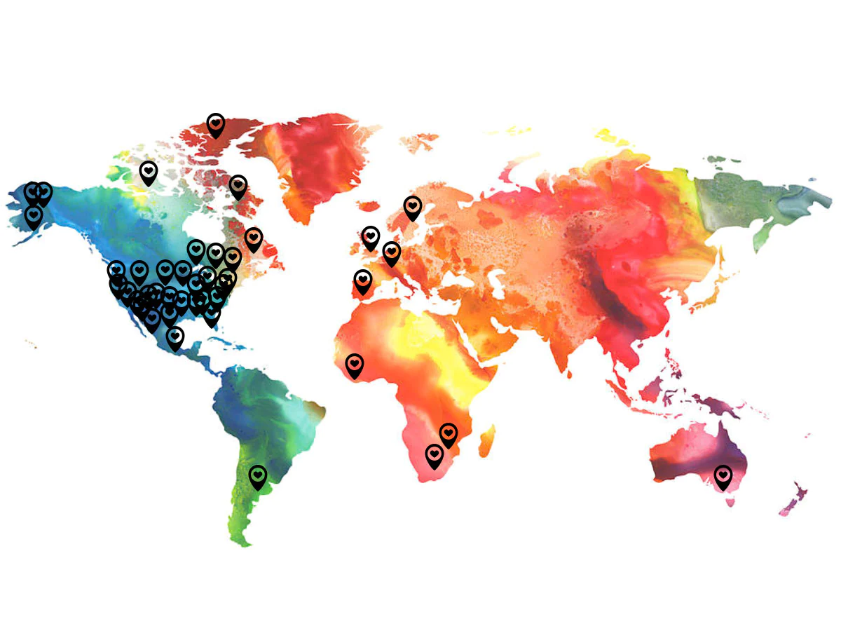 World map colored in painterly rainbow colors