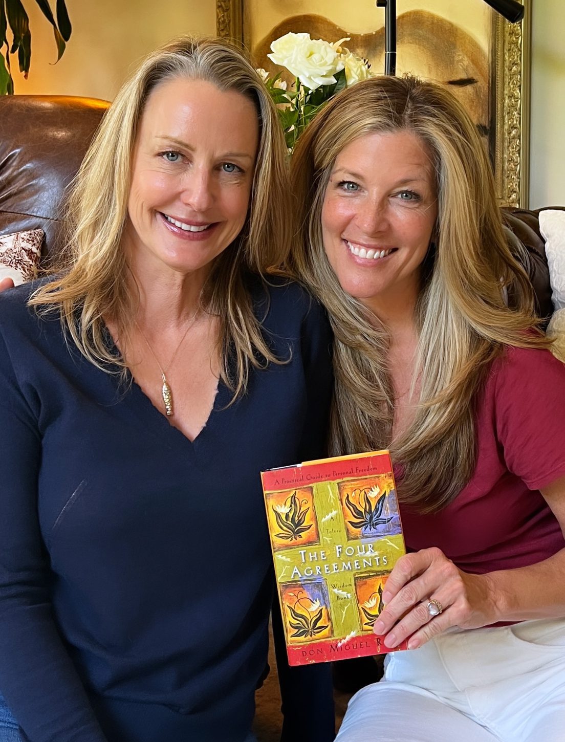 Elizabeth and Laura holding book