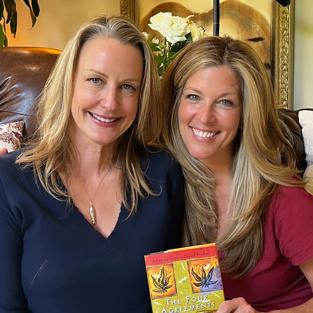 Elizabeth and Laura holding book